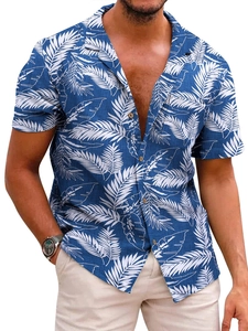 Detail of navy blue shirt with white palm leaf print and vintage texture buttons