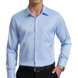 Detail of light blue men's long sleeve shirt with white buttons and chest pocket