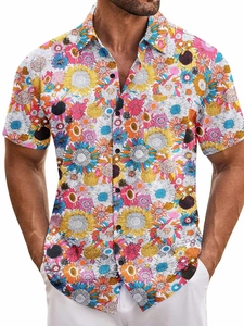 Detail shot of vibrant sunflower print and front pocket on men's short sleeve beach shirt