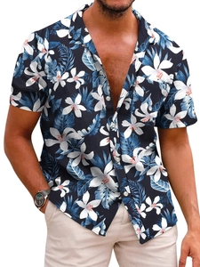 Detailed close-up of a men's navy blue Hawaiian shirt with white floral prints and buttons
