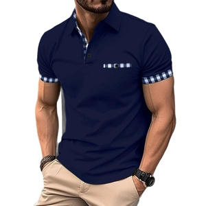 Men's navy polo shirt with plaid trim details and chest pocket in slim fit