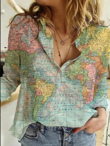 Detail of long sleeve shirt with vintage world map print and classic button-down collar