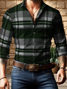 Detail of men's dark green plaid shirt with dark buttons and brown leather belt