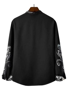 Detail view of black men's long sleeve shirt with white artistic prints on sleeves