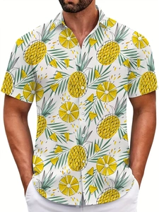 Detail of men's short-sleeve shirt showing tropical pineapple and palm leaf print pattern