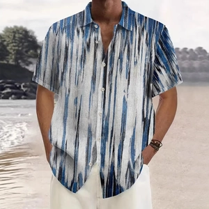 Detail of men's short-sleeve shirt featuring blue and black abstract vertical stripes