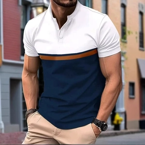 Detailed view of tri-color block polo shirt featuring white, blue, and orange panels