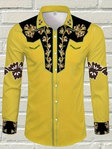 Detail of yellow men's western shirt with black floral print on collar and chest