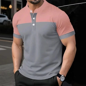 Detail of pink and gray color block polo shirt showing the Henley neck and buttons