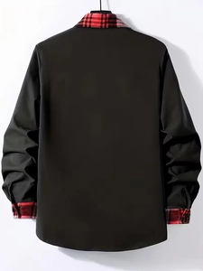 Detail showing the red and black plaid collar and cuff contrast on a black shirt