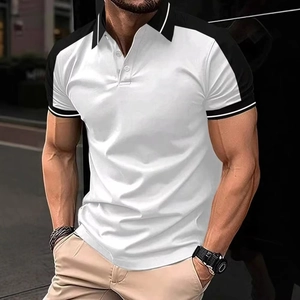 Close-up of the black and white polo collar with stripe details and button placket