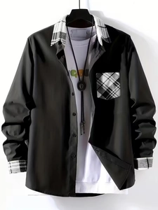 Detail of men's black casual shirt featuring stylish black and white plaid collar accents