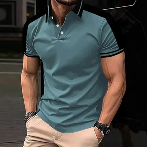 Detailed close-up of teal polo shirt featuring black contrast collar and three-button placket