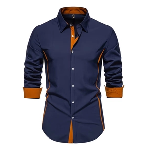 Detail view of navy blue shirt with orange contrast lining on collar and cuffs