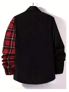 Detail view of long sleeve shirt featuring asymmetric red black plaid and black panels