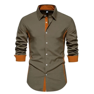 Detail of olive green shirt with orange contrast stitching and size S label