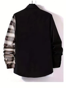 Detail view of men's long sleeve shirt featuring black fabric and plaid sleeve patchwork