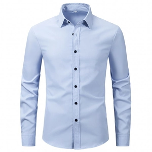 Detail view of light blue business shirt with dark buttons and twill texture