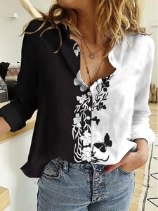 Detail of long sleeve button-down shirt featuring black white contrast floral butterfly print