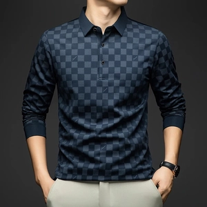 Detail of navy blue checkered knitted polo shirt with classic collar and logo embroidery
