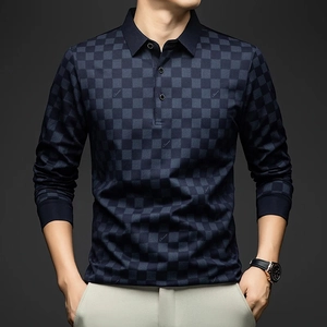 Detail of navy checkerboard jacquard fabric on a slim fit long sleeve polo shirt
