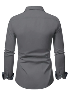 Detail view of charcoal gray slim-fit men's long sleeve shirt with contrast cuff lining