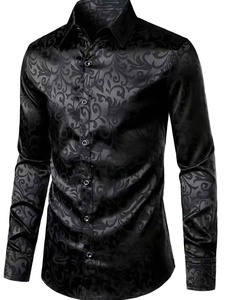 Detail of black long-sleeve shirt featuring intricate paisley jacquard pattern and silk-like shine