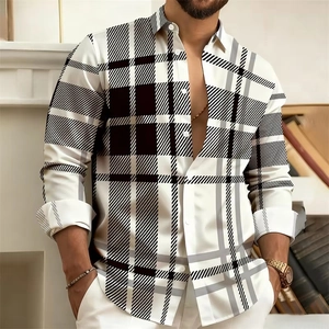 Detail of slim fit long sleeve shirt showing plaid pattern and buttoned collar