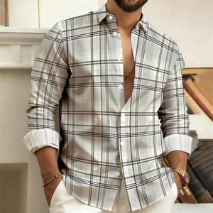 Close-up of men's gray and white plaid shirt showing button-down lapel and fabric texture