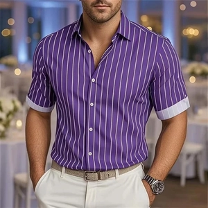 Detail of purple striped shirt showing the white contrast cuff design and classic collar