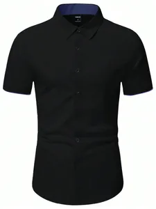 Close-up of black short-sleeved shirt with contrast navy collar lining and size tag