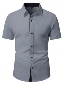 Detail of grey shirt neckline with black contrast trim and HAMFINITY brand label
