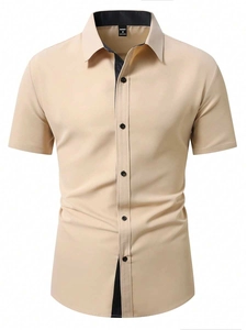 Detailed view of casual short sleeve shirt collar with black contrast trim and buttons
