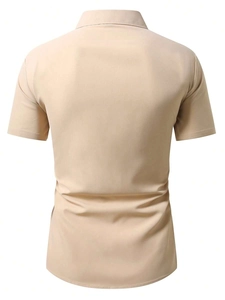 Detailed back view of men's slim-fit short-sleeved casual shirt in beige showing clean cut