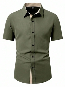 Detail view of olive green shirt showing beige contrast stitching on collar and buttons