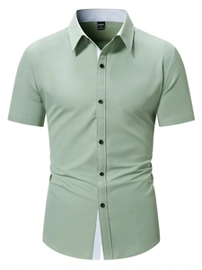 Detail of light green short sleeve shirt collar with white inner contrast lining