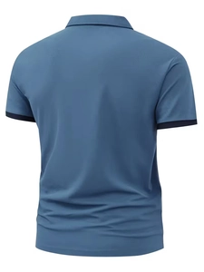 Back view of a men's blue short-sleeved polo shirt with dark navy trim on the sleeve cuffs