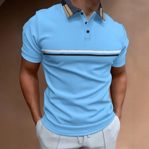 Detail of light blue polo shirt featuring classic beige plaid collar and striped chest