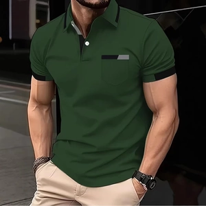 Detail of dark green polo shirt featuring contrast striped collar and chest pocket detail