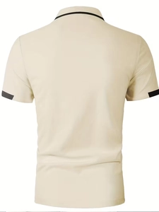 Back view of a beige short-sleeve polo shirt with black contrast trim on collar