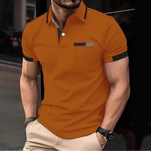 Detail of orange men's Polo shirt with contrasting grey pocket trim and collar edges