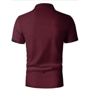Men's slim fit burgundy polo shirt with black trim details and breathable pique texture