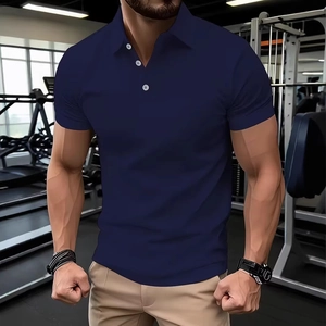 Detail of slim fit dark blue polo shirt showing classic collar and white buttons