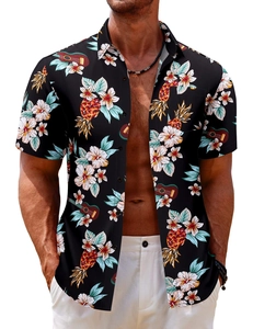 Detail of tropical floral print on a men's black short-sleeve Hawaiian beach shirt