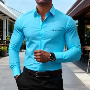 Close-up of turquoise slim-fit shirt featuring a black cursive signature logo on the chest