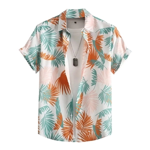 Detailed view of palm leaf printed summer shirt with teal, orange and pink tropical pattern