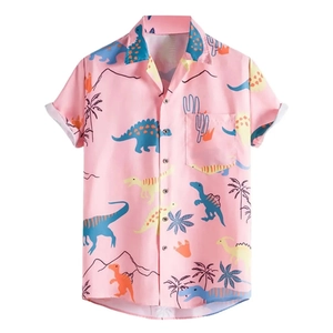 Detail of dinosaur print, standard collar, and front pocket on summer short sleeve shirt