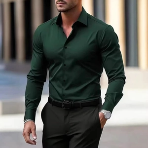 Detail of dark green men's long sleeve slim fit shirt with premium smooth texture fabric