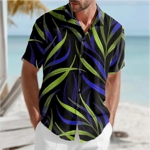 Detail of slim fit tropical leaf print short sleeve shirt for men on a sunny beach