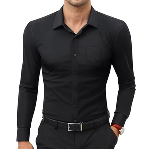 Detail of classic black slim fit men's business shirt with front pocket and button collar